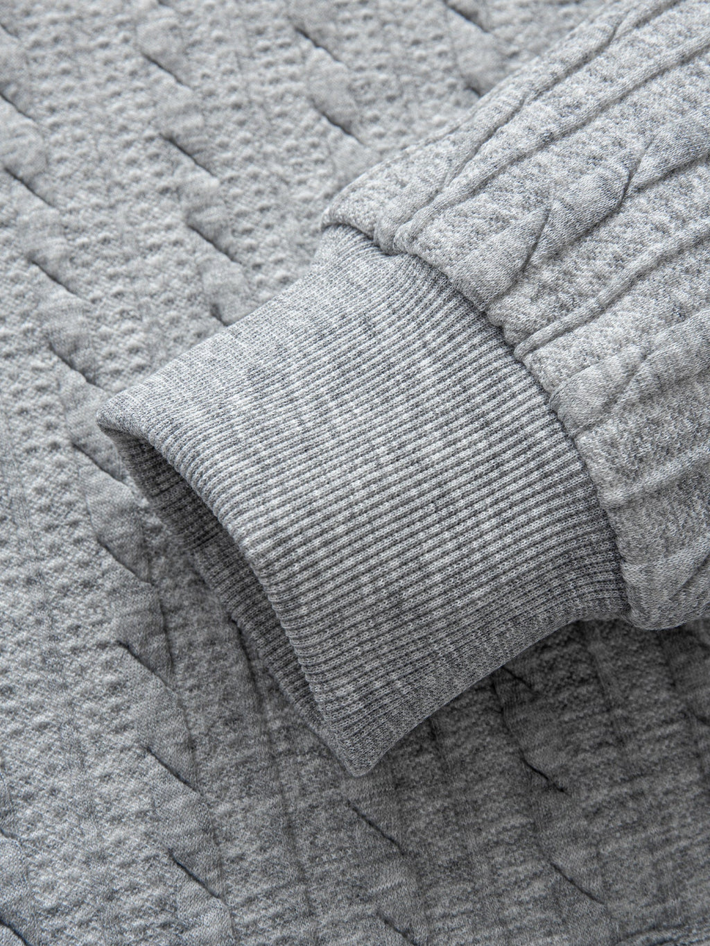 Sweat à capuche zippé en jacquard torsadé coupe décontractée