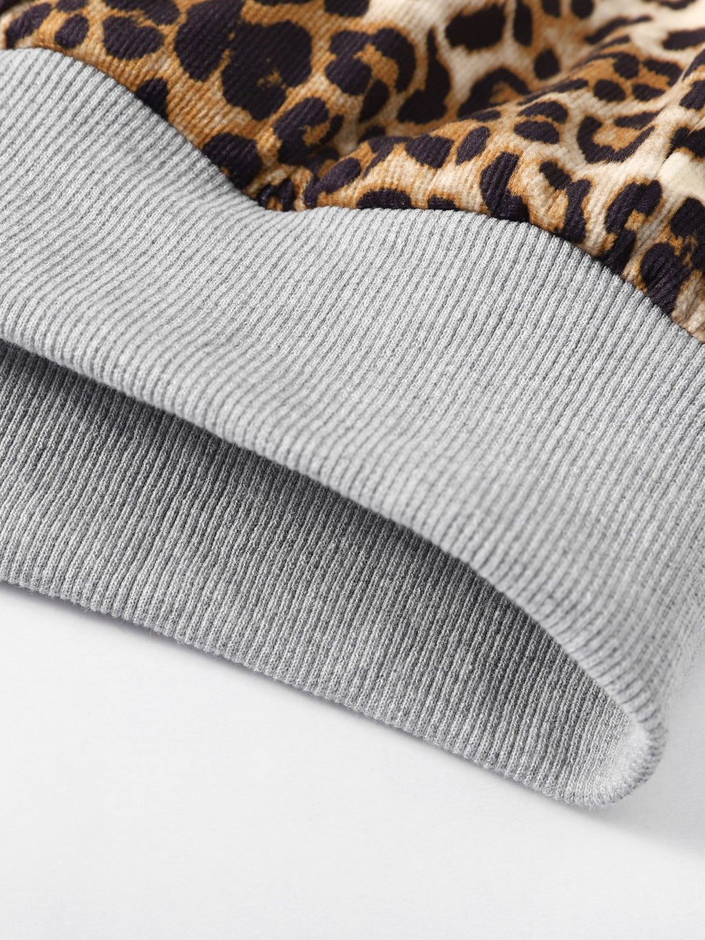 Sudadera con capucha, ajuste holgado y forro de leopardo reversible