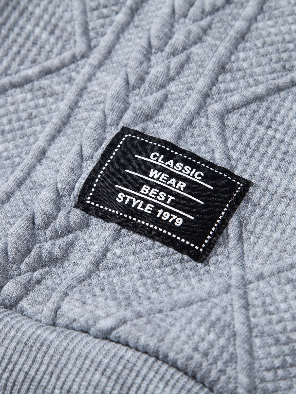 Sudadera con capucha de corte holgado y jacquard geométrico