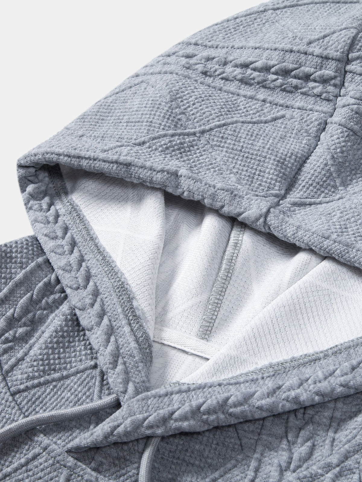 Sudadera con capucha de corte holgado y jacquard geométrico