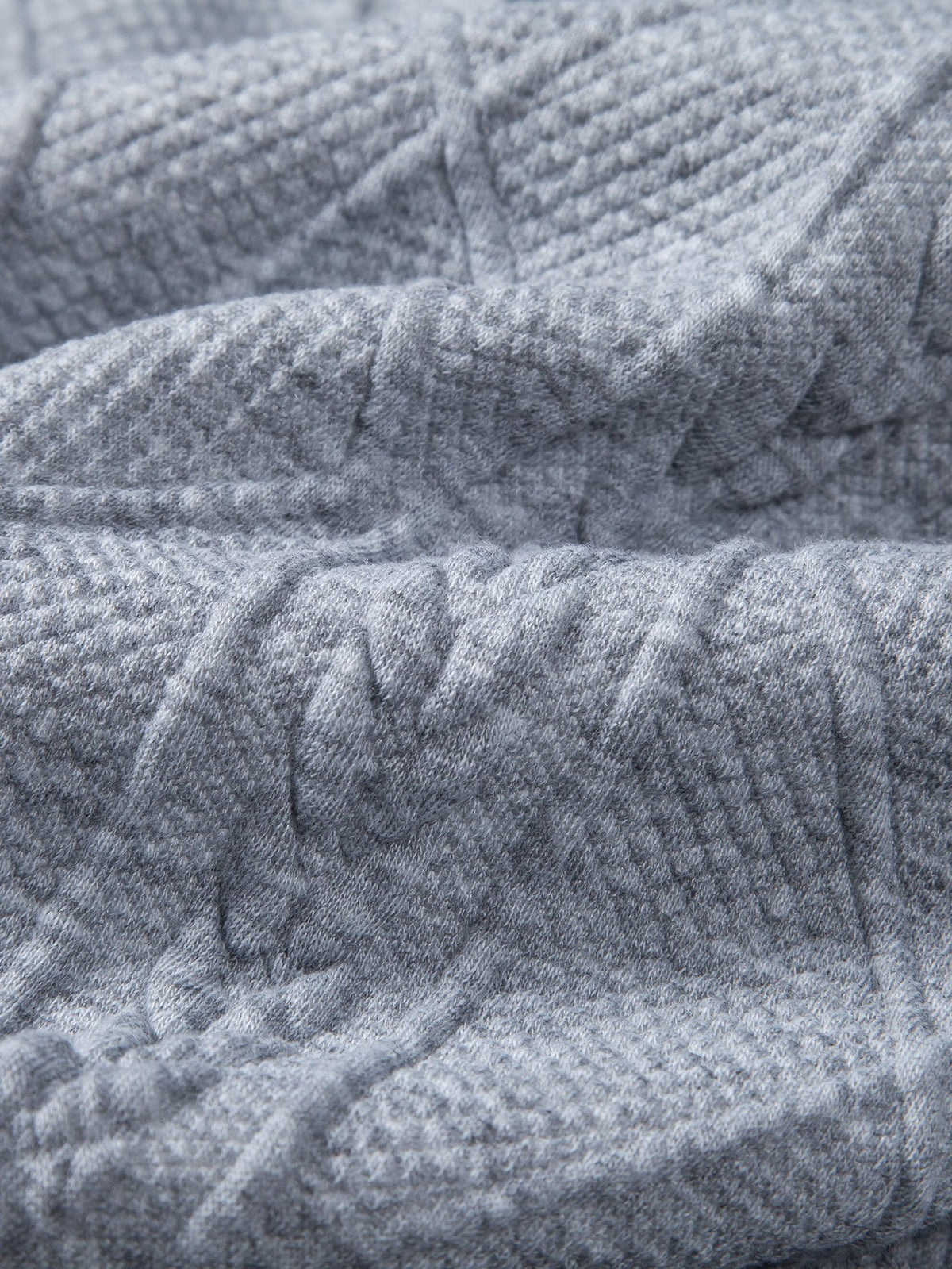 Sudadera con capucha de corte holgado y jacquard geométrico